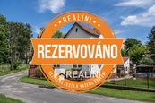 Prodej rodinného domu s dvěmi garážemi v Karviné na ulici Cihelní, cena 1 CZK / objekt, nabízí